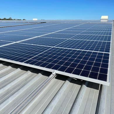 Services 1 Solar panels installed on a commercial building roof