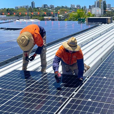 Services 3 Maintenance team working on a solar panel